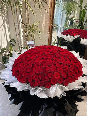 Fresh Red Roses Wrapped with white/black Paper