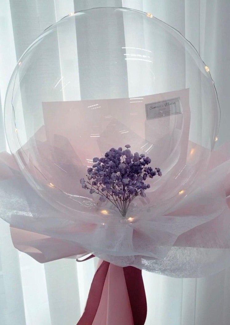 Purple Baby's Breath in balloon flower bouquet Summers Winter Florist