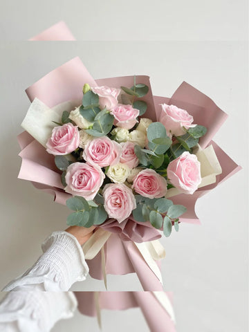 Fresh Roses wrapped with white/pink wrappings