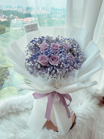 Purple Roses and Baby Breath Bouquet