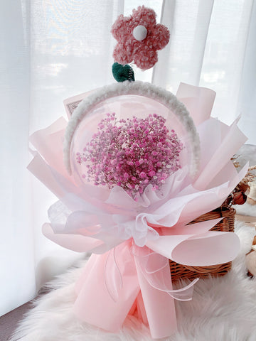 Pink baby breath flower in acrylic ball